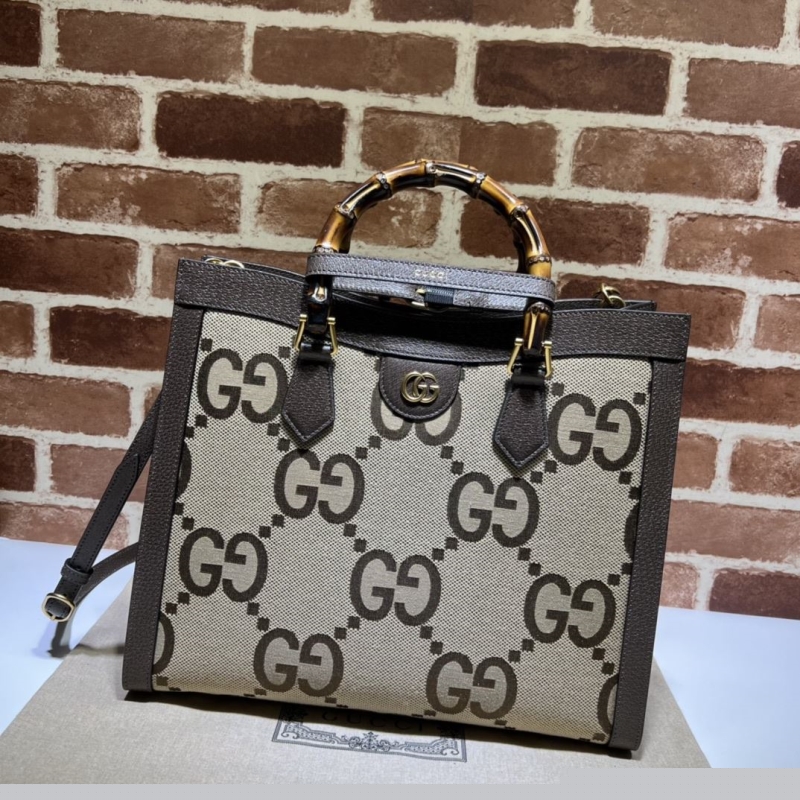 G*u*i top handle bags